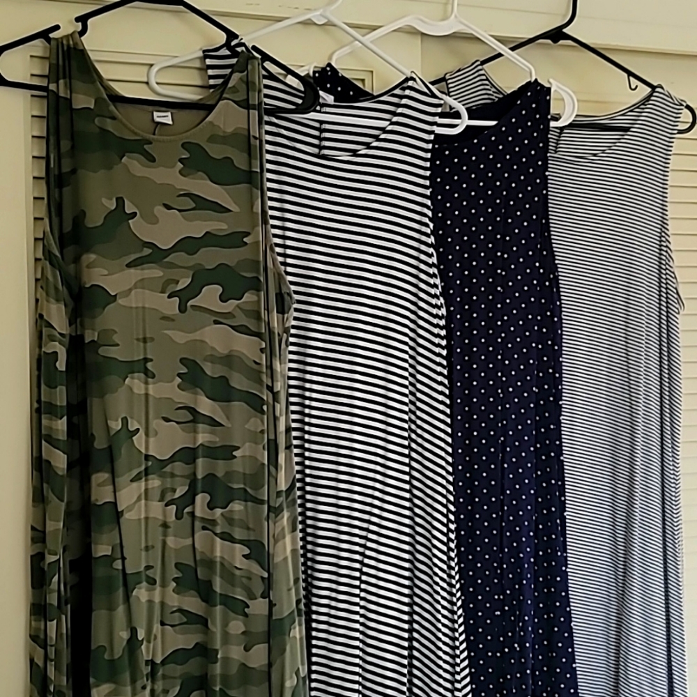 Sold as a bundle.  4 old navy sleeveless tank dresses.  All hit at the knee
